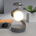 Lampada da scrivania rotante a forma di luna con sensore di ricarica wireless per telefono, lampada da tavolo decorativa, piccola lampada da notte per la casa.
