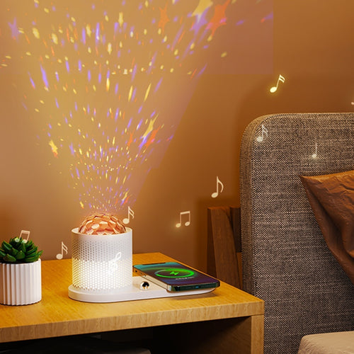 Altoparlante Bluetooth con caricatore wireless e lampada notturna con proiettore di cielo stellato.