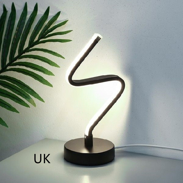 Lampada da tavolo LED moderna a forma di spirale, luce da comodino in ferro, per scrivania e decorazione casa